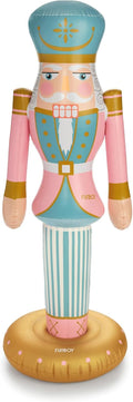 Pastel pink and mint nutcracker inflatable standing on a round gold base