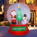 Snow globe inflatable on a red Merry Christmas base with Santa, a tree and a snowman inside