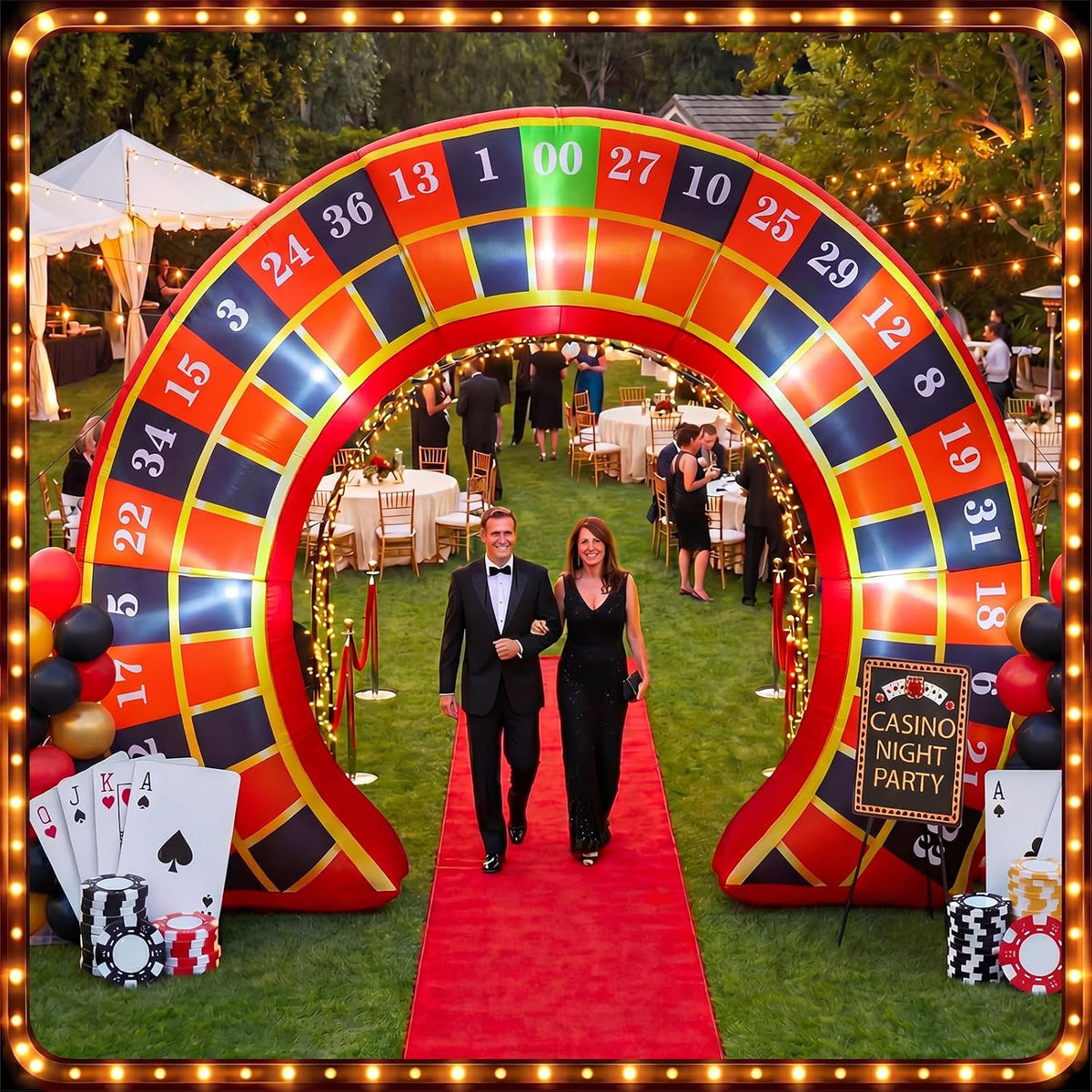 Roulette wheel inflatable arch over a red carpet at an outdoor casino night party