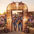 Wood-look Wild West arch inflatable with a longhorn skull at an outdoor western party