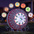 Giant bloodshot eyeball inflatable with a projected eye and several expression samples around it